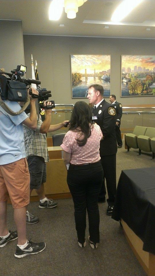 Chief White interviewed by a television crew